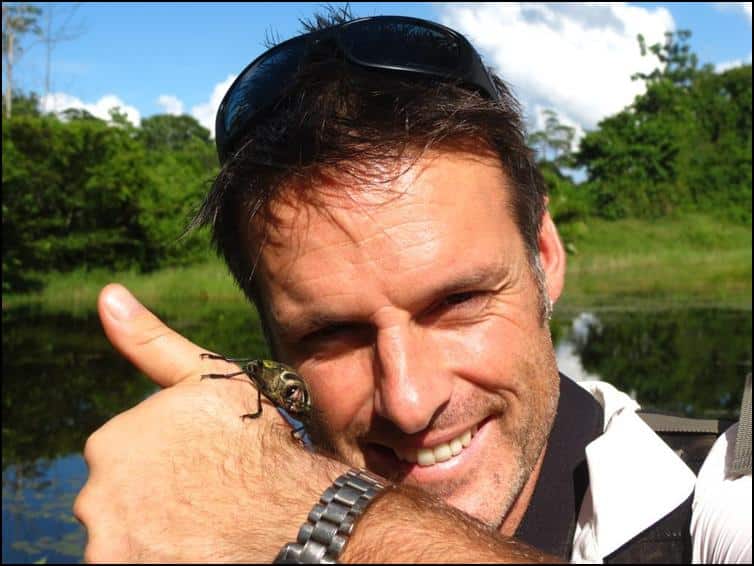Nick Baker holding Ceiba borer beetle